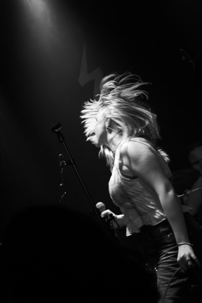 Lead singer of The Captain performing live on stage